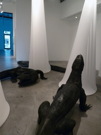 Installation View of Marisol Rendón: So, Dragons Do Exist?  2013 Wood, fabric, lighting Variable dimensions.